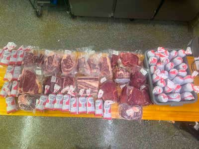 Packaged farm-direct beef from Golden Hawk Farms showing a quarter beef order after processing
